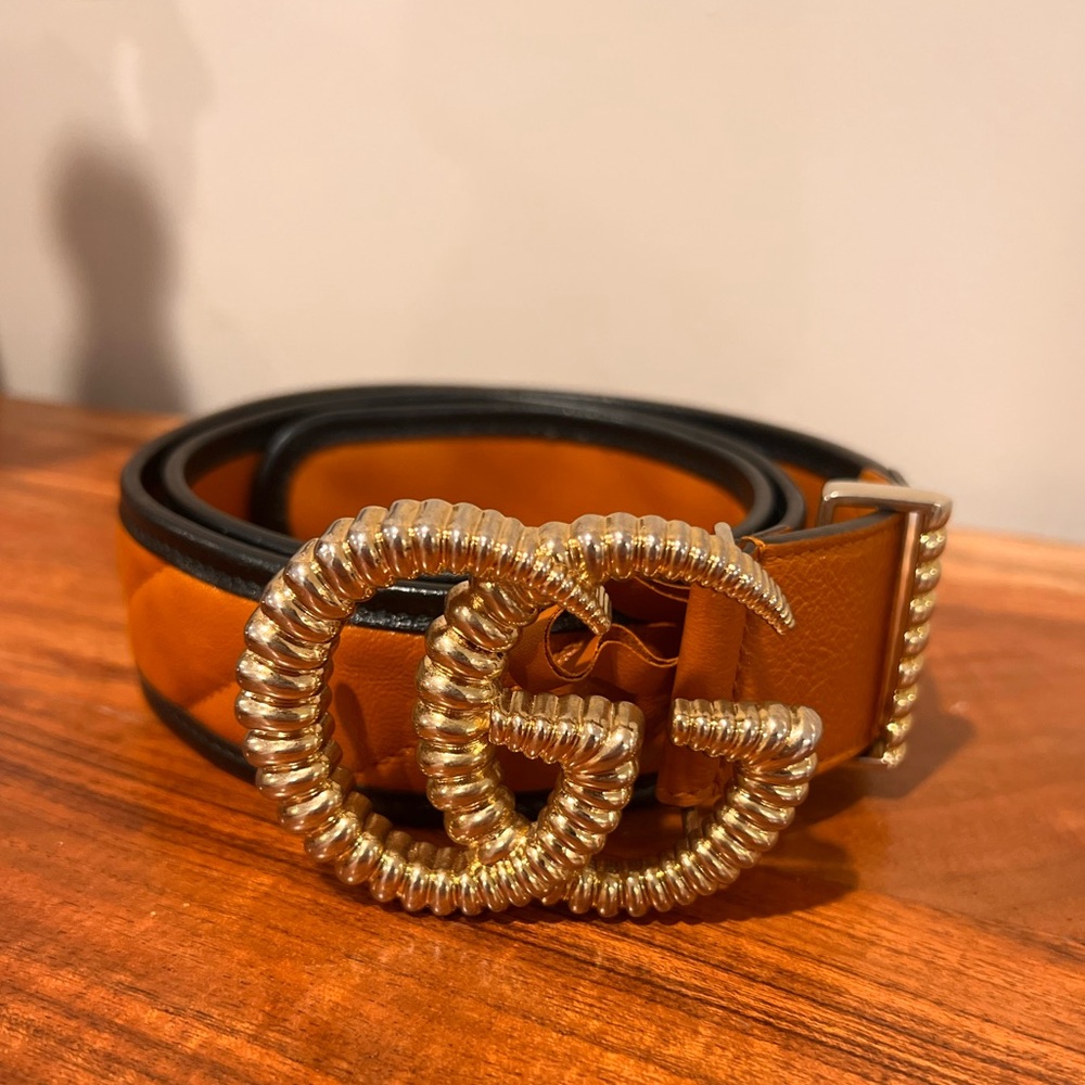 Gucci Logo Buckle
Matelasse Leather Belt